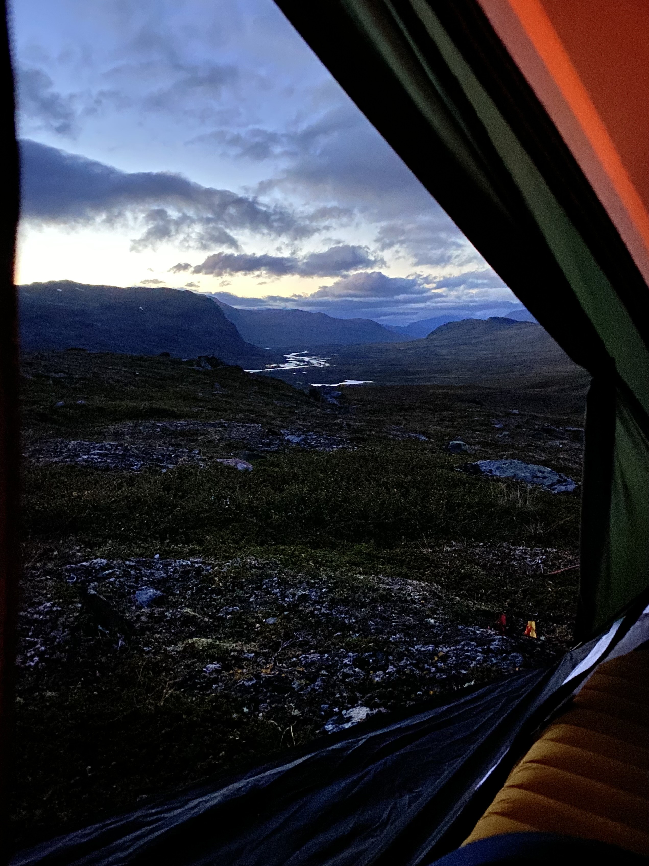 A picture of the view from my tent, looking out over the sunset